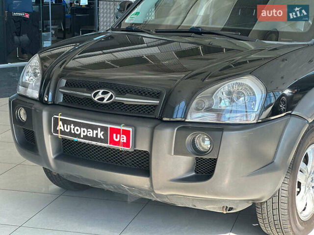 Черный Хендай Туксон, объемом двигателя 2.7 л и пробегом 158 тыс. км за 7940 $, фото 4 на Automoto.ua