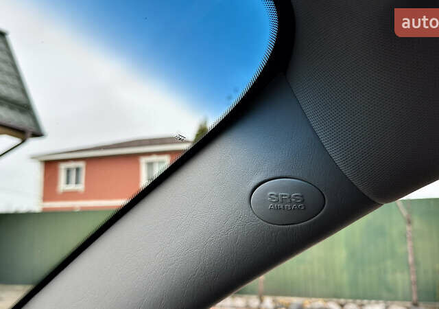 Чорний Хендай Туксон, об'ємом двигуна 2 л та пробігом 182 тис. км за 8299 $, фото 78 на Automoto.ua