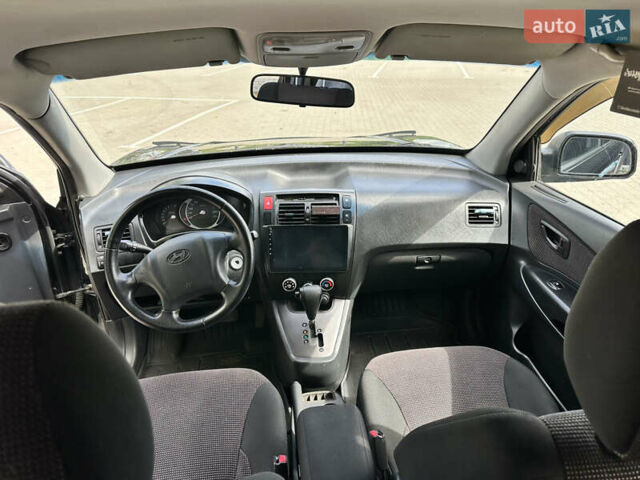 Чорний Хендай Туксон, об'ємом двигуна 1.98 л та пробігом 279 тис. км за 8200 $, фото 21 на Automoto.ua