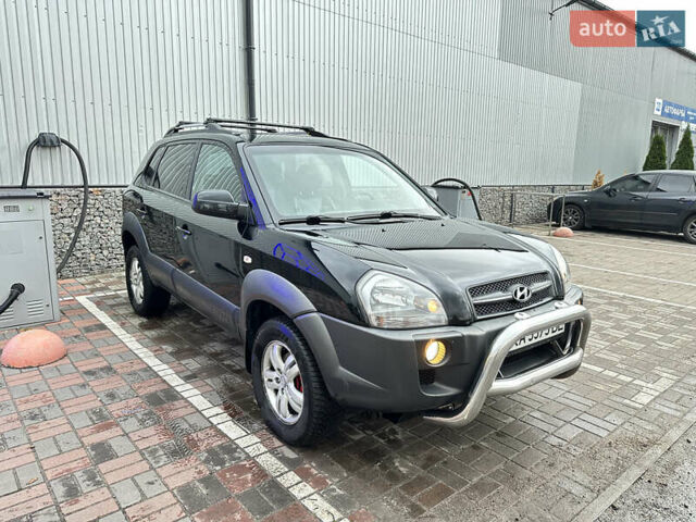 Чорний Хендай Туксон, об'ємом двигуна 2.66 л та пробігом 395 тис. км за 9950 $, фото 2 на Automoto.ua