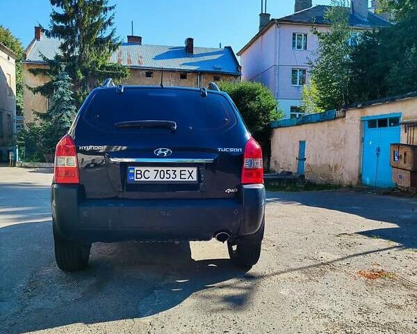 Черный Хендай Туксон, объемом двигателя 1.98 л и пробегом 330 тыс. км за 8200 $, фото 5 на Automoto.ua