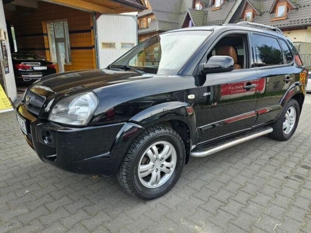 Черный Хендай Туксон, объемом двигателя 2 л и пробегом 287 тыс. км за 2400 $, фото 1 на Automoto.ua