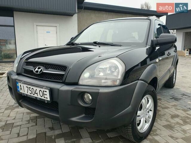 Чорний Хендай Туксон, об'ємом двигуна 2 л та пробігом 225 тис. км за 8000 $, фото 19 на Automoto.ua