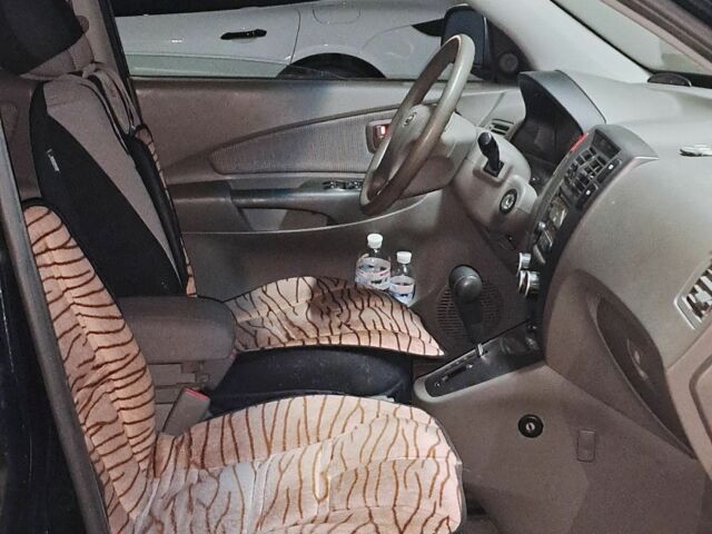 Хендай Туксон 2008 в Киеве на Automoto.ua Черный Хендай Туксон, объемом двигателя 2 л и пробегом 30 тыс. км за 12000 $, фото 10 на Automoto.ua