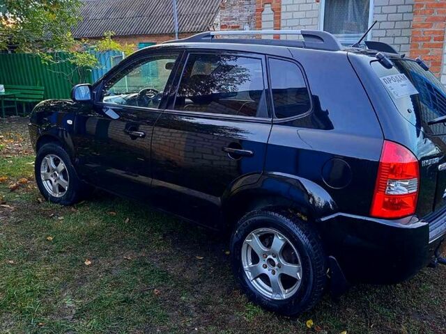 Черный Хендай Туксон, объемом двигателя 2 л и пробегом 187 тыс. км за 7900 $, фото 4 на Automoto.ua