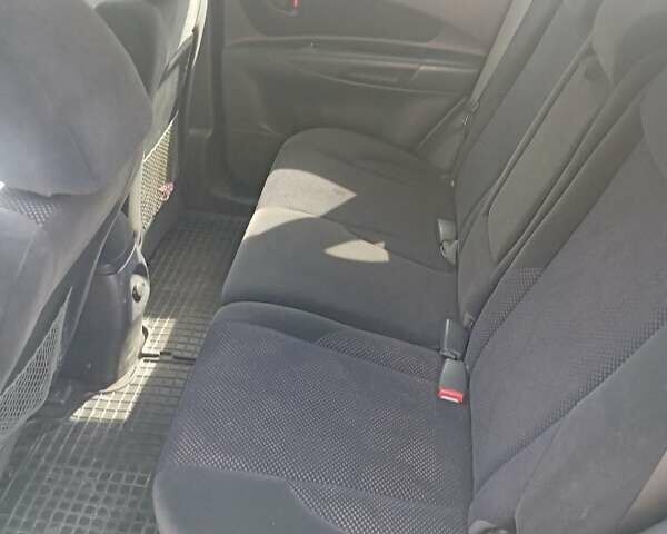 Черный Хендай Туксон, объемом двигателя 1.98 л и пробегом 195 тыс. км за 6981 $, фото 14 на Automoto.ua