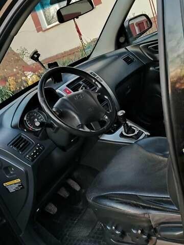 Черный Хендай Туксон, объемом двигателя 1.99 л и пробегом 203 тыс. км за 8000 $, фото 7 на Automoto.ua