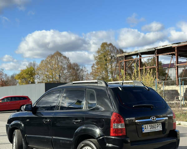 Черный Хендай Туксон, объемом двигателя 2 л и пробегом 300 тыс. км за 8300 $, фото 9 на Automoto.ua