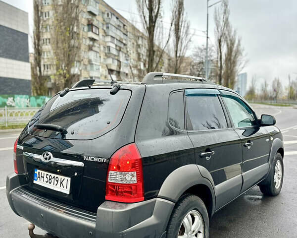 Чорний Хендай Туксон, об'ємом двигуна 1.98 л та пробігом 238 тис. км за 8499 $, фото 13 на Automoto.ua