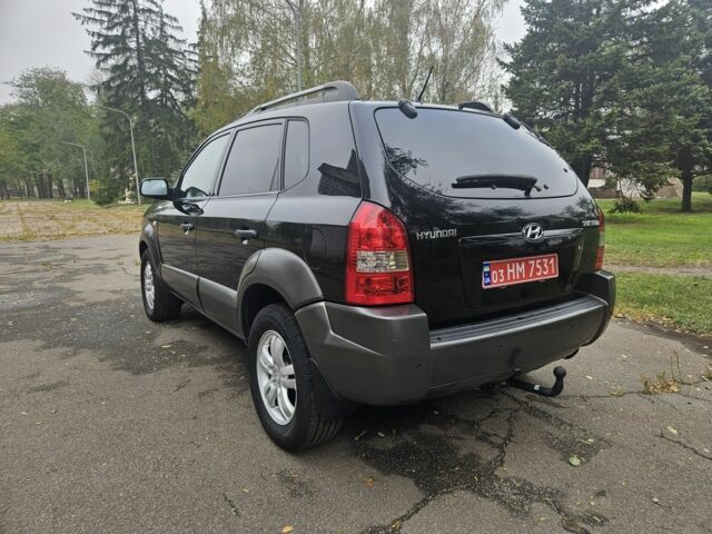Чорний Хендай Туксон, об'ємом двигуна 2 л та пробігом 186 тис. км за 8300 $, фото 8 на Automoto.ua