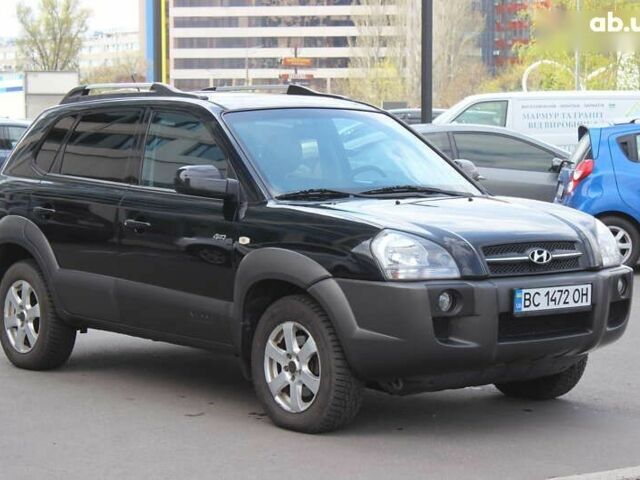 Черный Хендай Туксон, объемом двигателя 2 л и пробегом 210 тыс. км за 8999 $, фото 3 на Automoto.ua