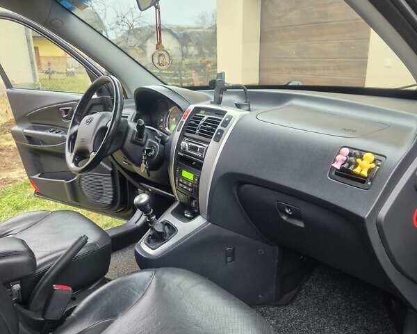 Чорний Хендай Туксон, об'ємом двигуна 1.99 л та пробігом 181 тис. км за 8150 $, фото 15 на Automoto.ua
