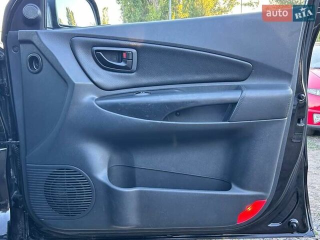 Черный Хендай Туксон, объемом двигателя 2 л и пробегом 230 тыс. км за 7500 $, фото 29 на Automoto.ua