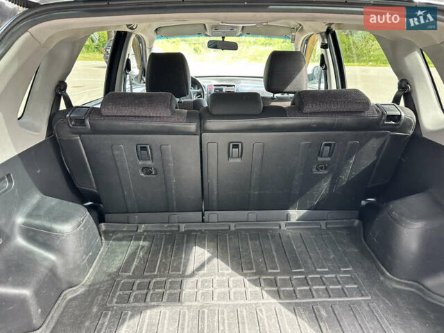 Чорний Хендай Туксон, об'ємом двигуна 1.98 л та пробігом 279 тис. км за 8200 $, фото 19 на Automoto.ua