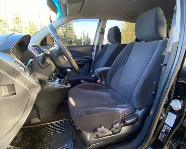 Черный Хендай Туксон, объемом двигателя 1.98 л и пробегом 218 тыс. км за 7200 $, фото 12 на Automoto.ua