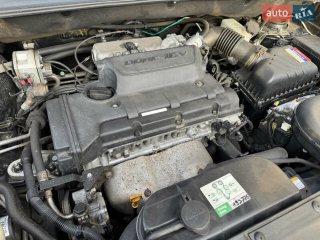 Черный Хендай Туксон, объемом двигателя 1.98 л и пробегом 196 тыс. км за 7999 $, фото 22 на Automoto.ua