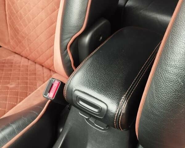 Черный Хендай Туксон, объемом двигателя 1.98 л и пробегом 214 тыс. км за 7700 $, фото 25 на Automoto.ua