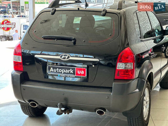 Черный Хендай Туксон, объемом двигателя 2.7 л и пробегом 158 тыс. км за 7940 $, фото 10 на Automoto.ua