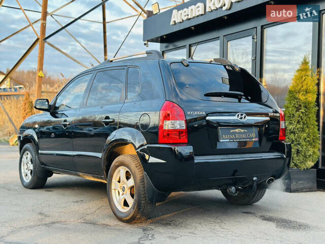 Чорний Хендай Туксон, об'ємом двигуна 2 л та пробігом 186 тис. км за 8300 $, фото 11 на Automoto.ua