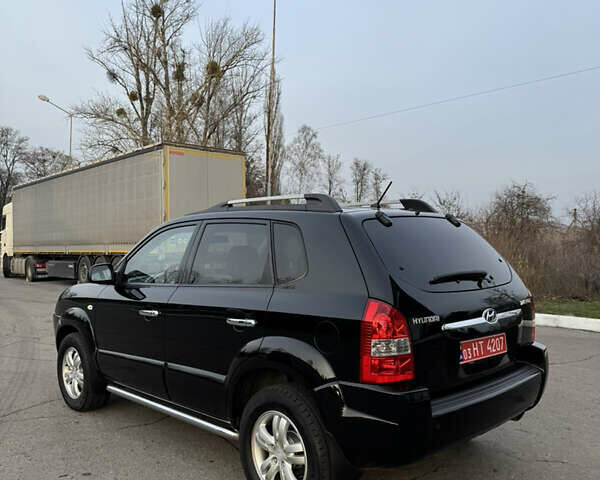 Черный Хендай Туксон, объемом двигателя 2 л и пробегом 210 тыс. км за 7850 $, фото 11 на Automoto.ua