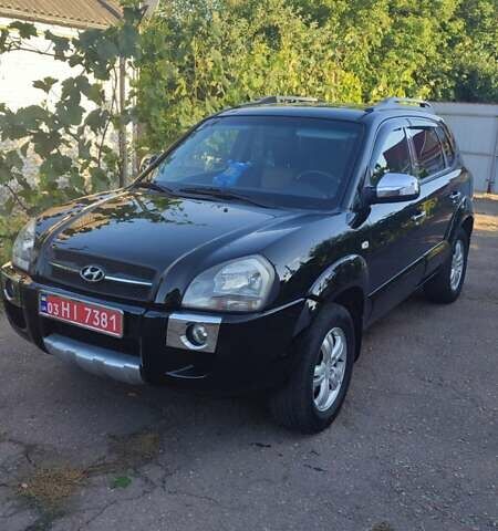 Черный Хендай Туксон, объемом двигателя 2 л и пробегом 215 тыс. км за 7999 $, фото 5 на Automoto.ua