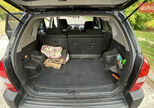 Чорний Хендай Туксон, об'ємом двигуна 2 л та пробігом 201 тис. км за 7800 $, фото 8 на Automoto.ua