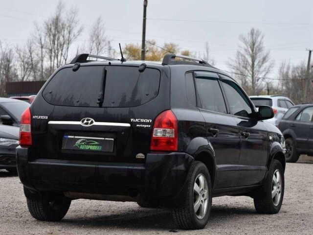 Чорний Хендай Туксон, об'ємом двигуна 2 л та пробігом 204 тис. км за 8650 $, фото 1 на Automoto.ua