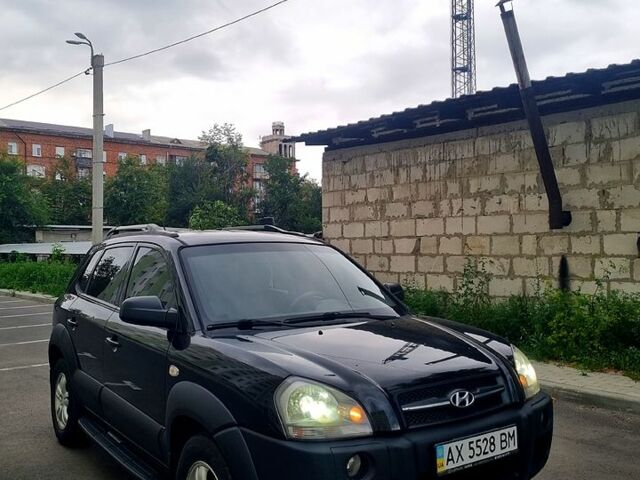 Черный Хендай Туксон, объемом двигателя 2 л и пробегом 152 тыс. км за 7800 $, фото 3 на Automoto.ua