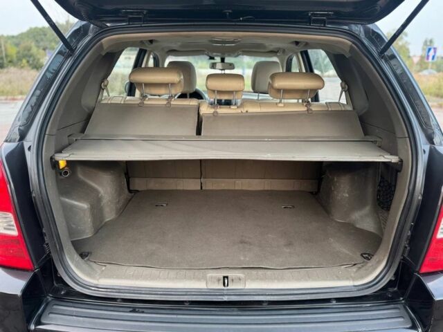 Черный Хендай Туксон, объемом двигателя 2 л и пробегом 353 тыс. км за 6800 $, фото 13 на Automoto.ua