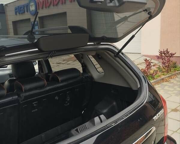 Черный Хендай Туксон, объемом двигателя 1.98 л и пробегом 214 тыс. км за 7700 $, фото 16 на Automoto.ua