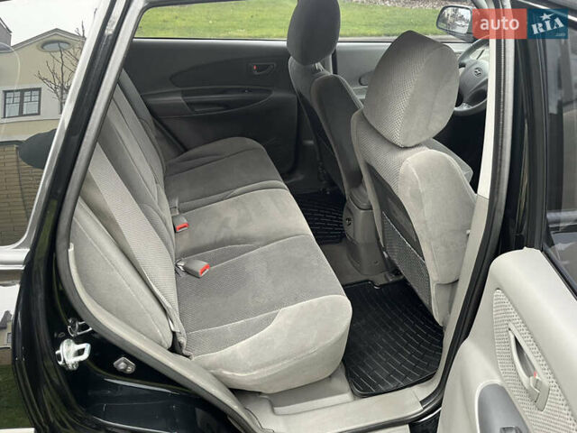 Черный Хендай Туксон, объемом двигателя 2 л и пробегом 107 тыс. км за 8900 $, фото 29 на Automoto.ua