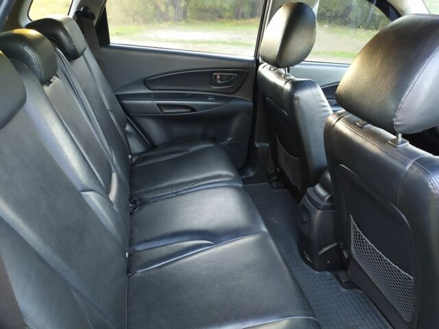 Черный Хендай Туксон, объемом двигателя 2 л и пробегом 162 тыс. км за 8500 $, фото 9 на Automoto.ua