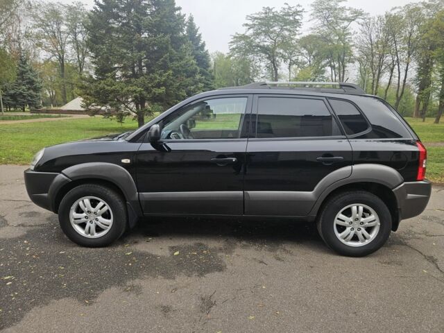 Чорний Хендай Туксон, об'ємом двигуна 2 л та пробігом 186 тис. км за 8300 $, фото 9 на Automoto.ua