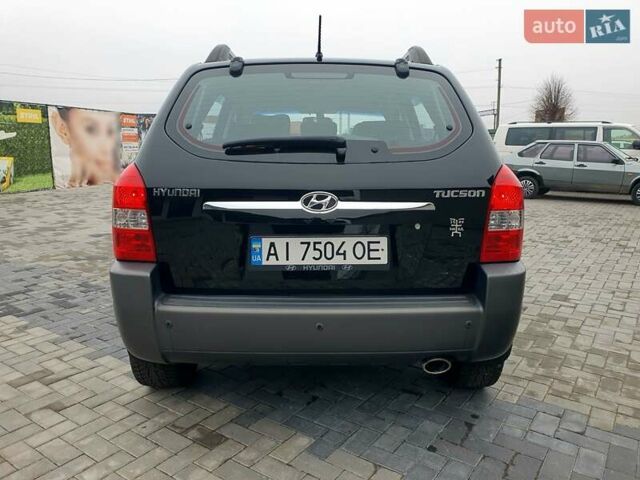 Чорний Хендай Туксон, об'ємом двигуна 2 л та пробігом 225 тис. км за 8000 $, фото 16 на Automoto.ua