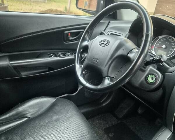 Чорний Хендай Туксон, об'ємом двигуна 1.99 л та пробігом 181 тис. км за 8150 $, фото 20 на Automoto.ua