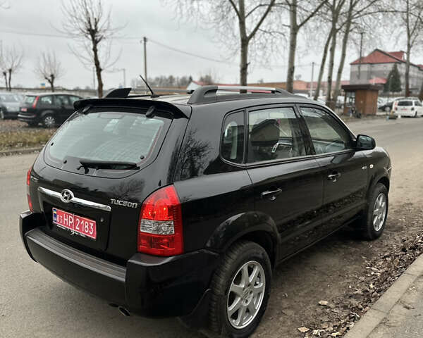 Черный Хендай Туксон, объемом двигателя 2 л и пробегом 136 тыс. км за 8500 $, фото 11 на Automoto.ua
