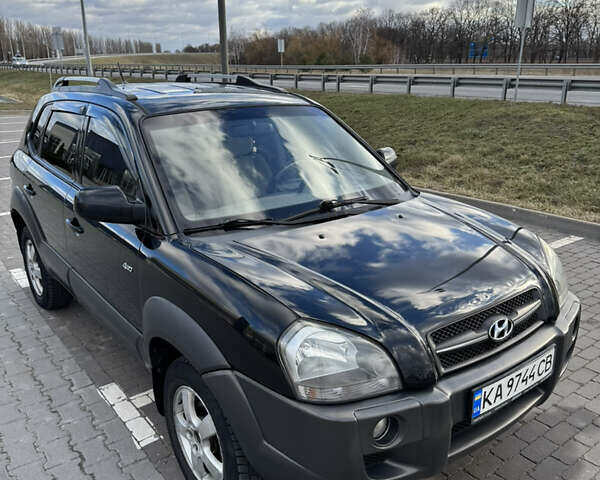 Чорний Хендай Туксон, об'ємом двигуна 1.98 л та пробігом 318 тис. км за 7399 $, фото 7 на Automoto.ua