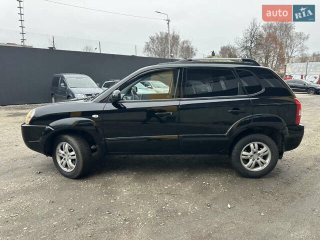 Чорний Хендай Туксон, об'ємом двигуна 2 л та пробігом 243 тис. км за 7999 $, фото 10 на Automoto.ua