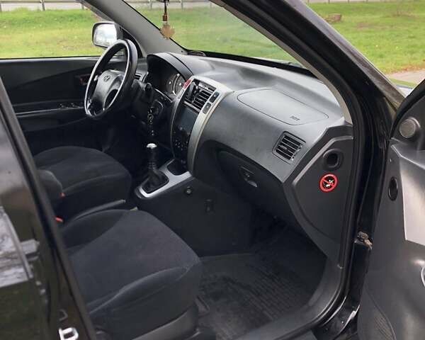 Чорний Хендай Туксон, об'ємом двигуна 1.98 л та пробігом 220 тис. км за 8000 $, фото 6 на Automoto.ua