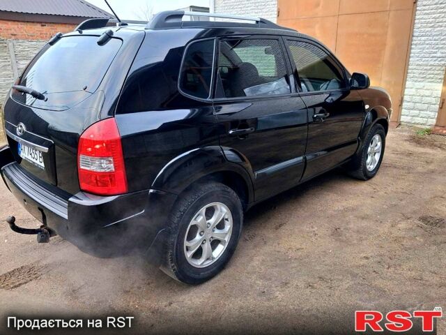 Чорний Хендай Туксон, об'ємом двигуна 2 л та пробігом 208 тис. км за 7500 $, фото 11 на Automoto.ua