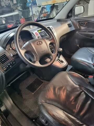 Черный Хендай Туксон, объемом двигателя 2.66 л и пробегом 311 тыс. км за 7200 $, фото 2 на Automoto.ua