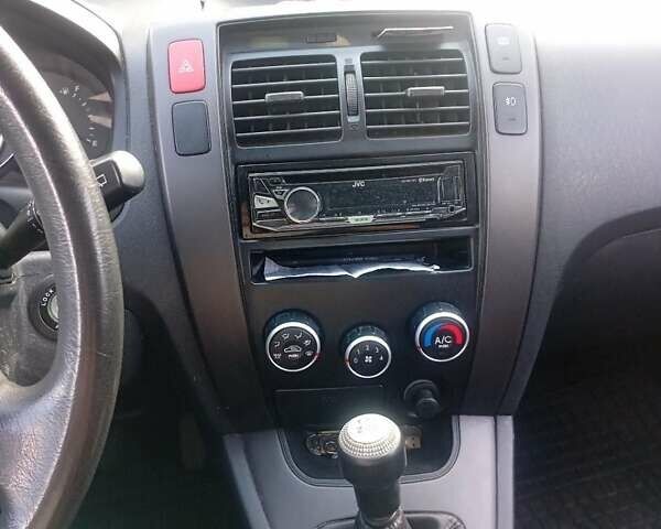 Черный Хендай Туксон, объемом двигателя 1.98 л и пробегом 195 тыс. км за 6981 $, фото 13 на Automoto.ua