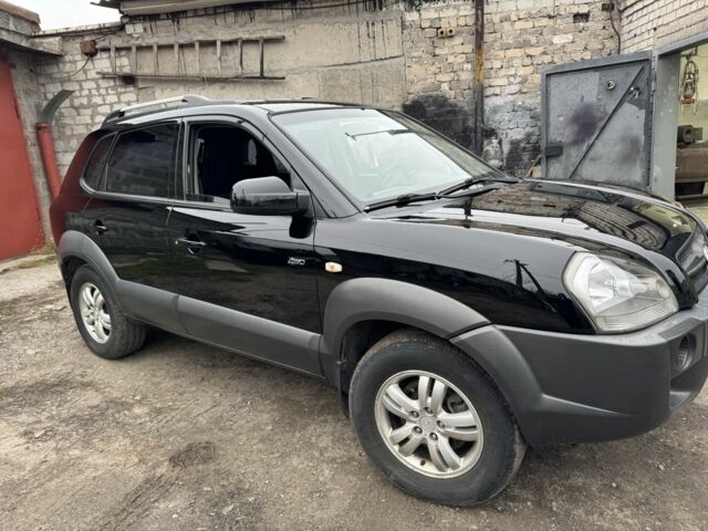 Чорний Хендай Туксон, об'ємом двигуна 2 л та пробігом 156 тис. км за 9200 $, фото 4 на Automoto.ua