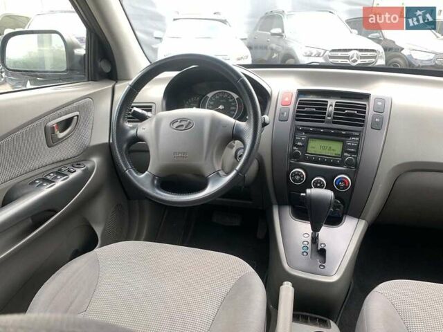 Черный Хендай Туксон, объемом двигателя 2 л и пробегом 117 тыс. км за 7990 $, фото 29 на Automoto.ua