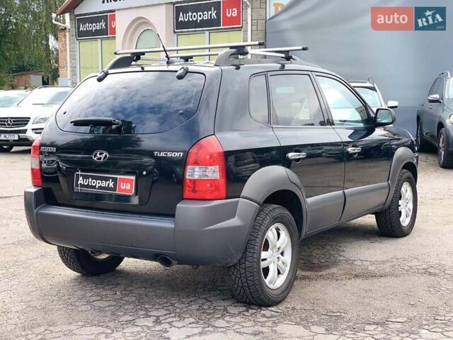 Черный Хендай Туксон, объемом двигателя 2 л и пробегом 117 тыс. км за 7990 $, фото 4 на Automoto.ua