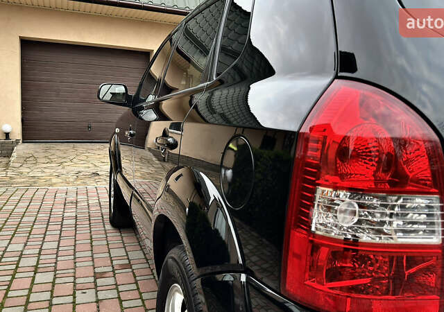 Чорний Хендай Туксон, об'ємом двигуна 2 л та пробігом 182 тис. км за 8299 $, фото 10 на Automoto.ua