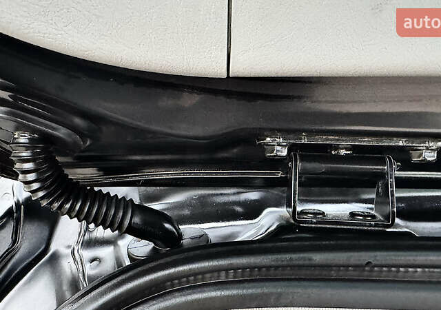 Чорний Хендай Туксон, об'ємом двигуна 2 л та пробігом 182 тис. км за 8299 $, фото 25 на Automoto.ua