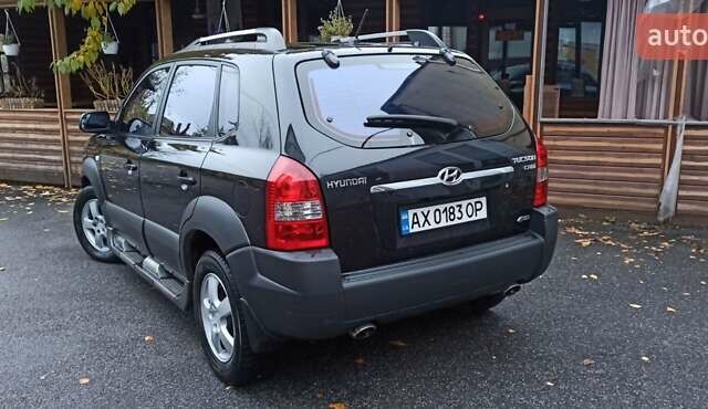 Хендай Туксон 2008 у Харкові на Automoto.ua Чорний Хендай Туксон, об'ємом двигуна 1.99 л та пробігом 188 тис. км за 8800 $, фото 10 на Automoto.ua