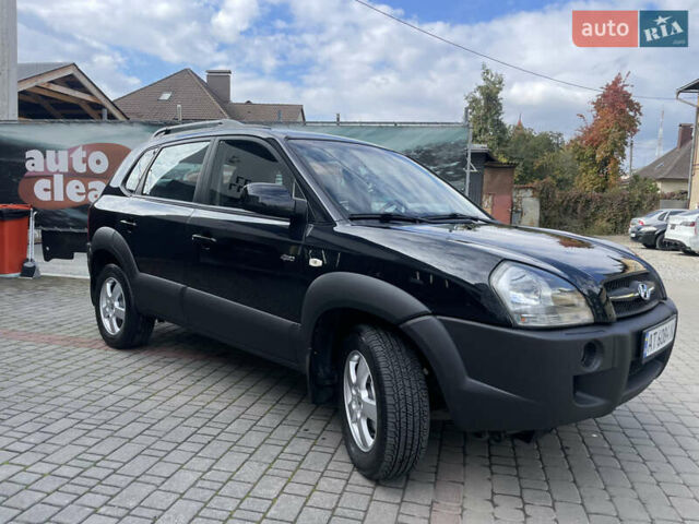 Черный Хендай Туксон, объемом двигателя 1.98 л и пробегом 177 тыс. км за 7600 $, фото 4 на Automoto.ua