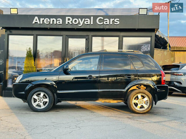 Чорний Хендай Туксон, об'ємом двигуна 2 л та пробігом 186 тис. км за 8300 $, фото 4 на Automoto.ua